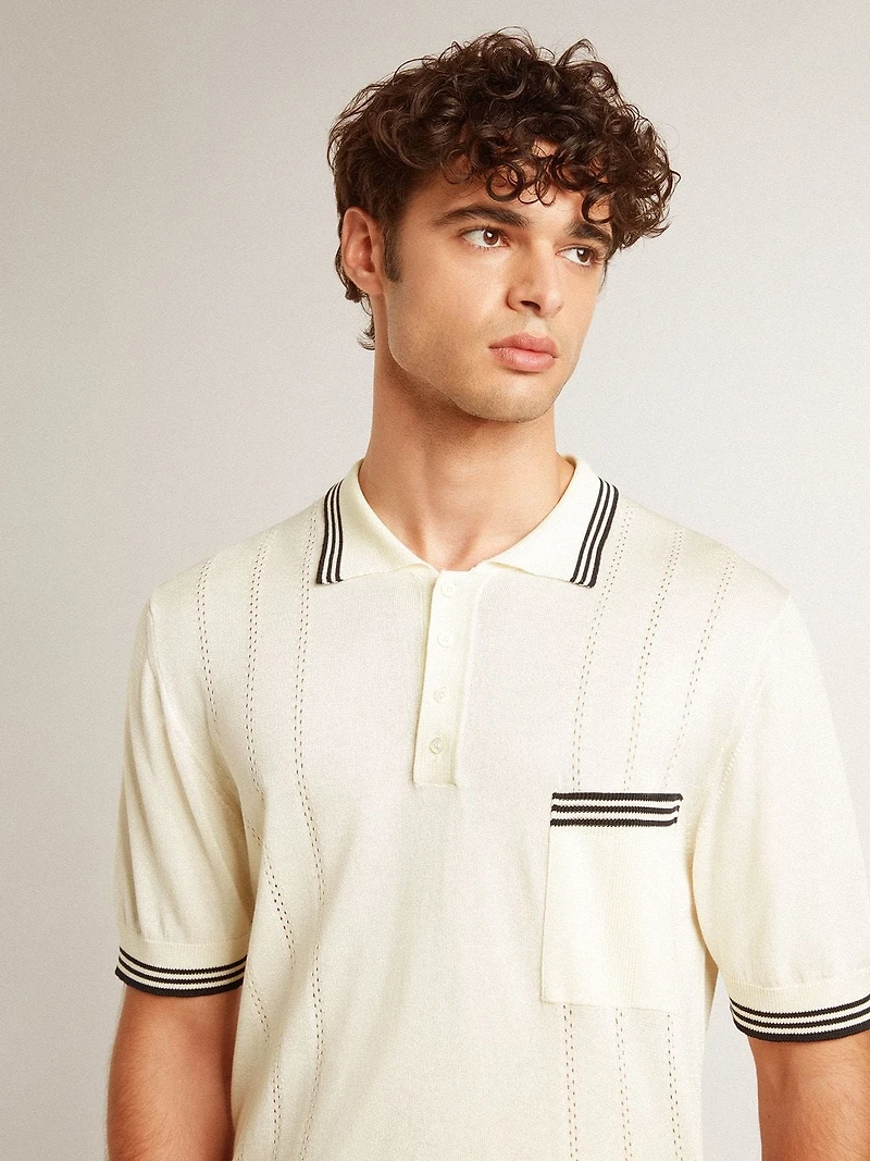 Men's worn-white knitted polo shirt with blue ribbing