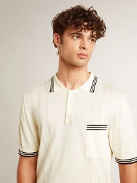 Men's worn-white knitted polo shirt with blue ribbing