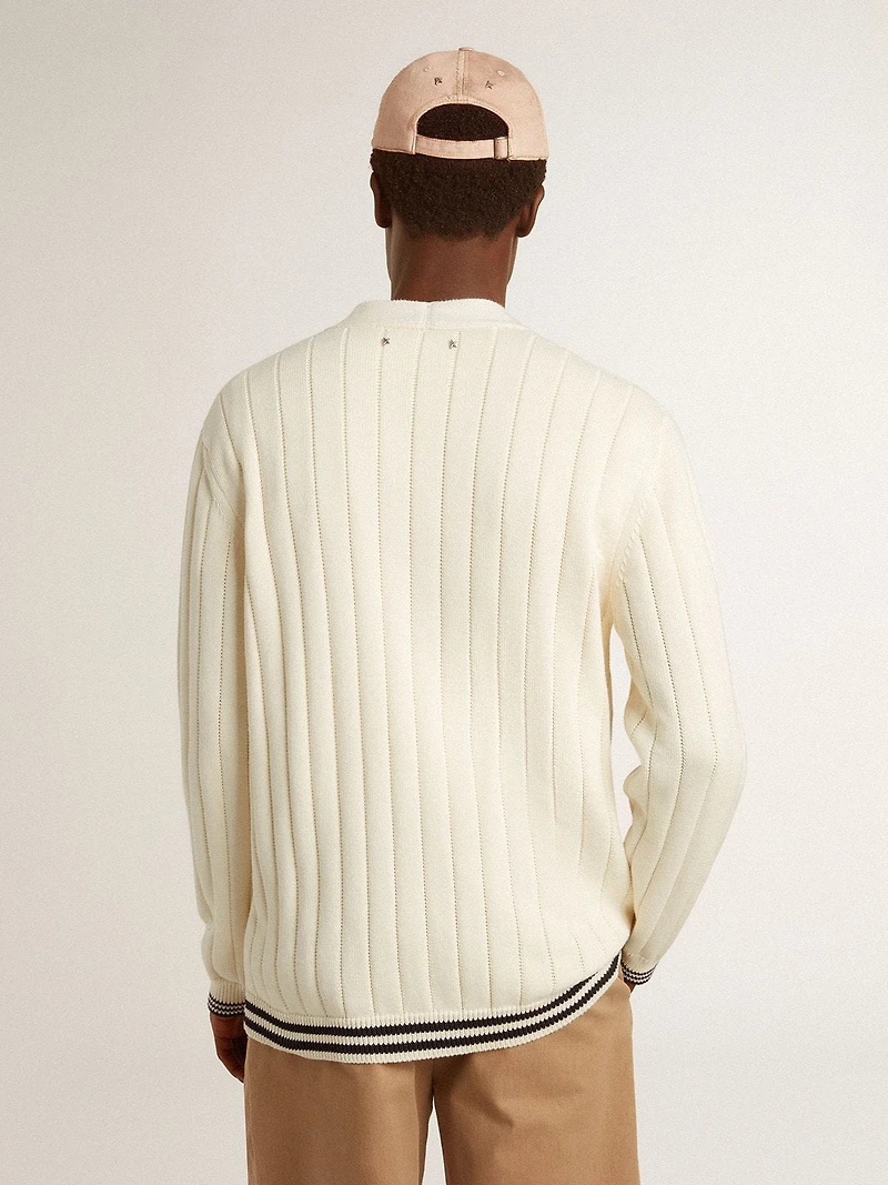 Men's white cotton cardigan with a cable pattern and blue ribbing