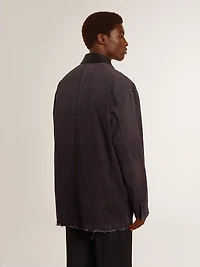 Men's denim jacket with distressed details and leather collar