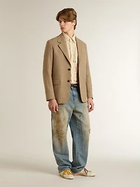Men's single-breasted blazer a sand-colored chevron linen blend.