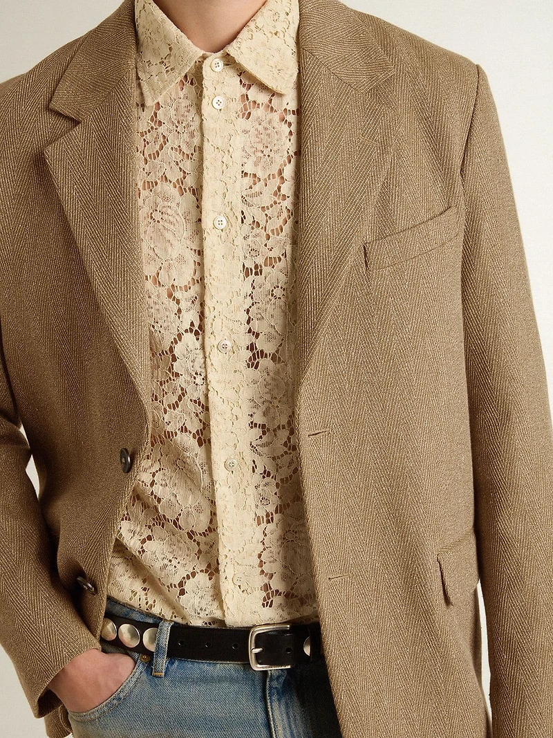 Men's single-breasted blazer a sand-colored chevron linen blend.