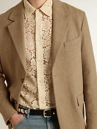 Men's single-breasted blazer a sand-colored chevron linen blend.