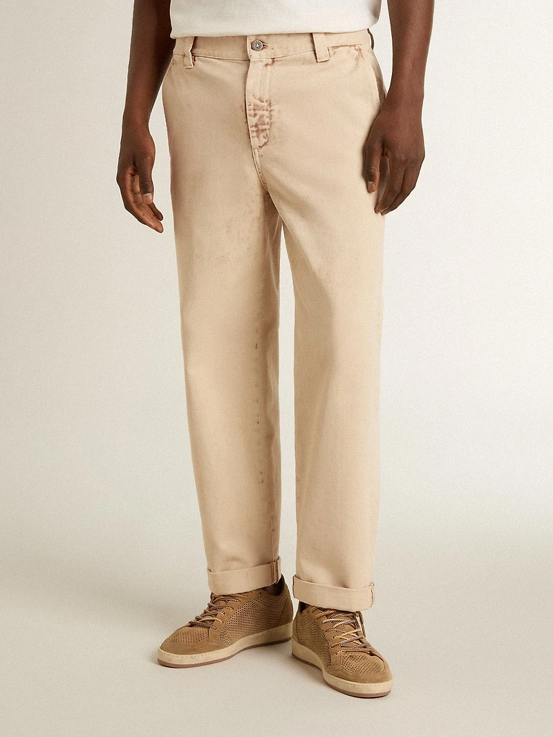 Men's beige chinos with a lived-in look finish