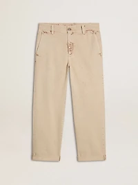 Men's beige chinos with a lived-in look finish