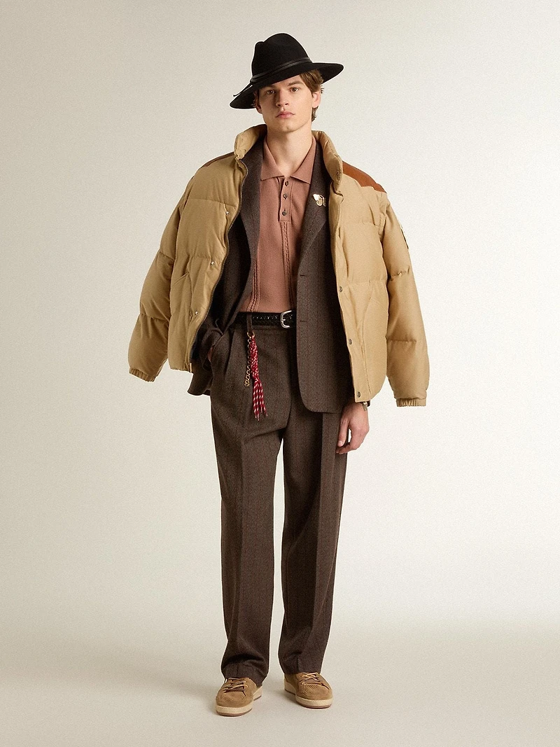 Men's brick-colored polo with embroidered logo.