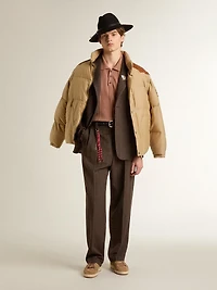 Men's brick-colored polo with embroidered logo.