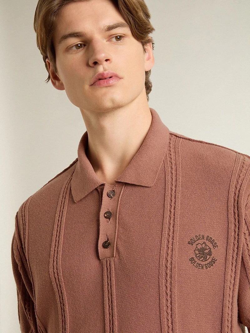Men's brick-colored polo with embroidered logo.