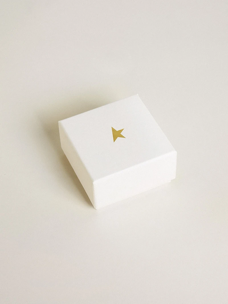 Bee-shaped charm in gold-colored brass with crystals