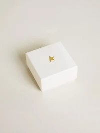 Bee-shaped charm in gold-colored brass with crystals