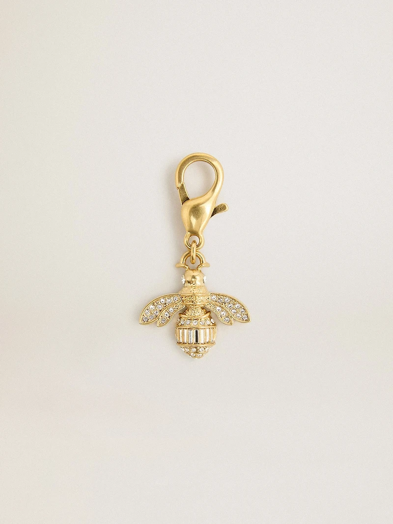 Bee-shaped charm in gold-colored brass with crystals