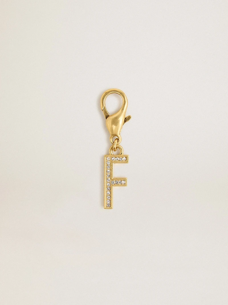 Letter F charm in gold-colored brass with crystals