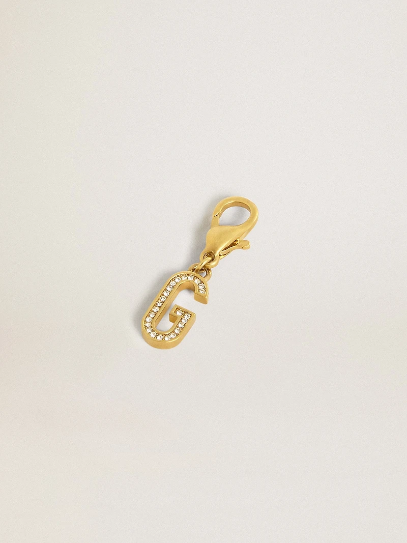 Letter charm in gold-colored brass with crystals