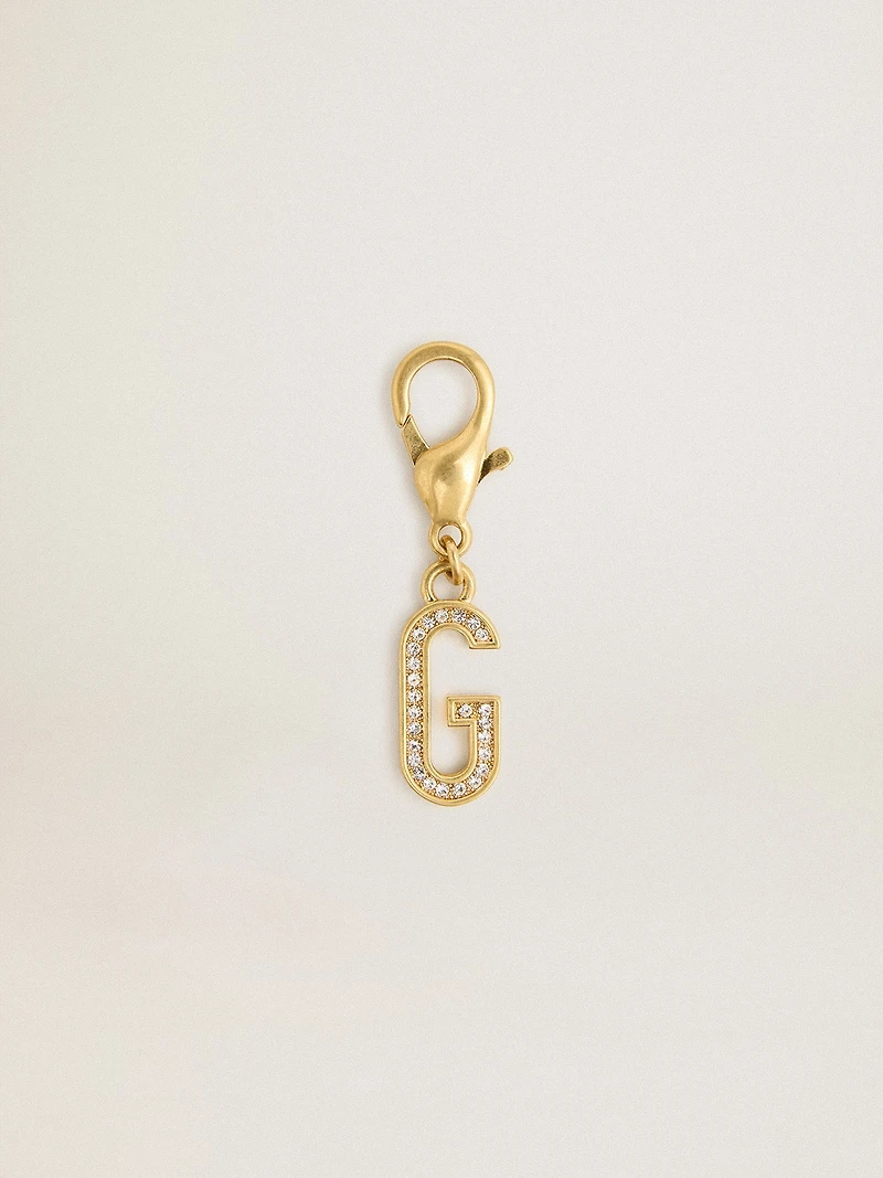 Letter charm in gold-colored brass with crystals