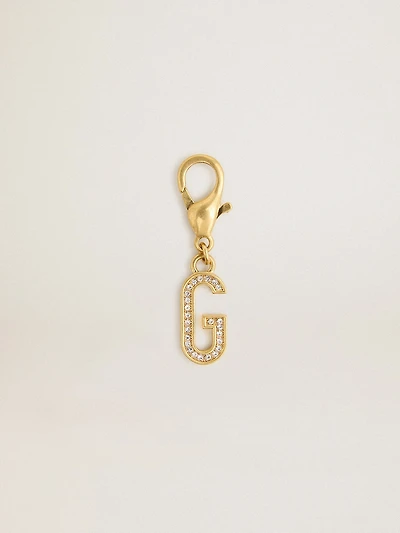 Letter charm in gold-colored brass with crystals