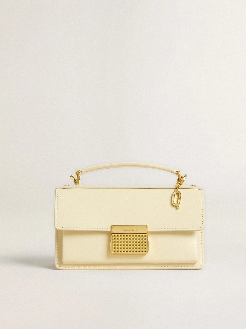 Letter Q charm in gold-colored brass with crystals