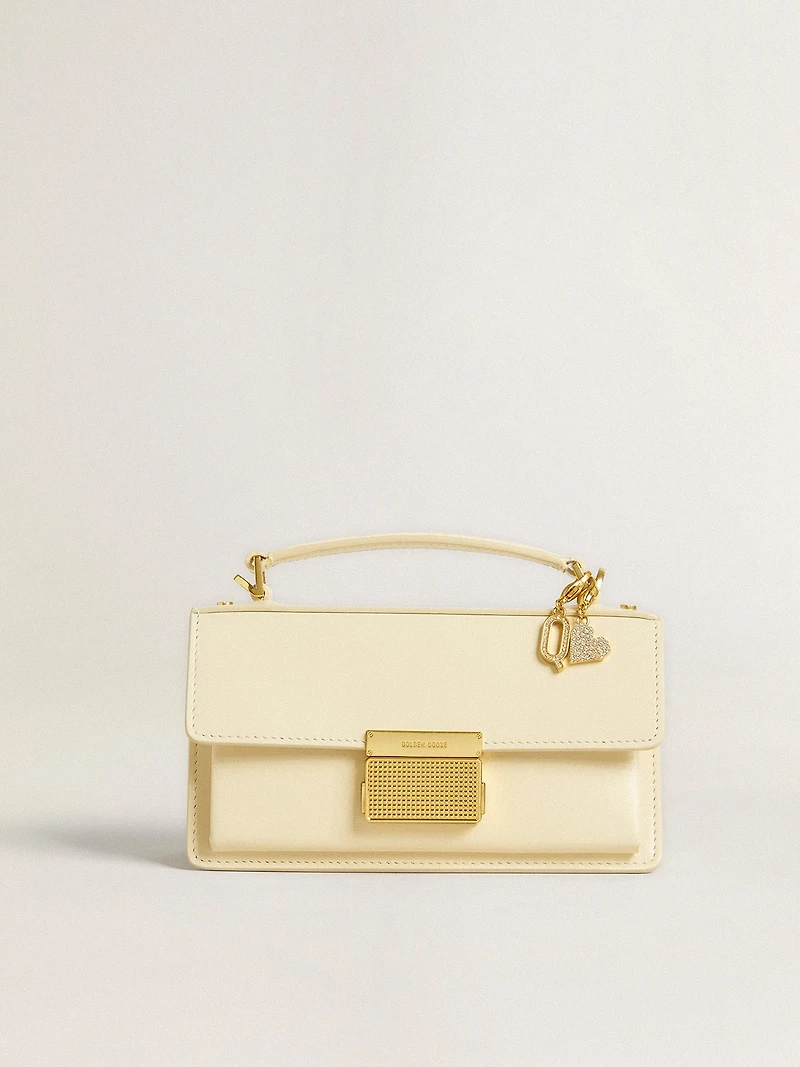 Letter Q charm in gold-colored brass with crystals