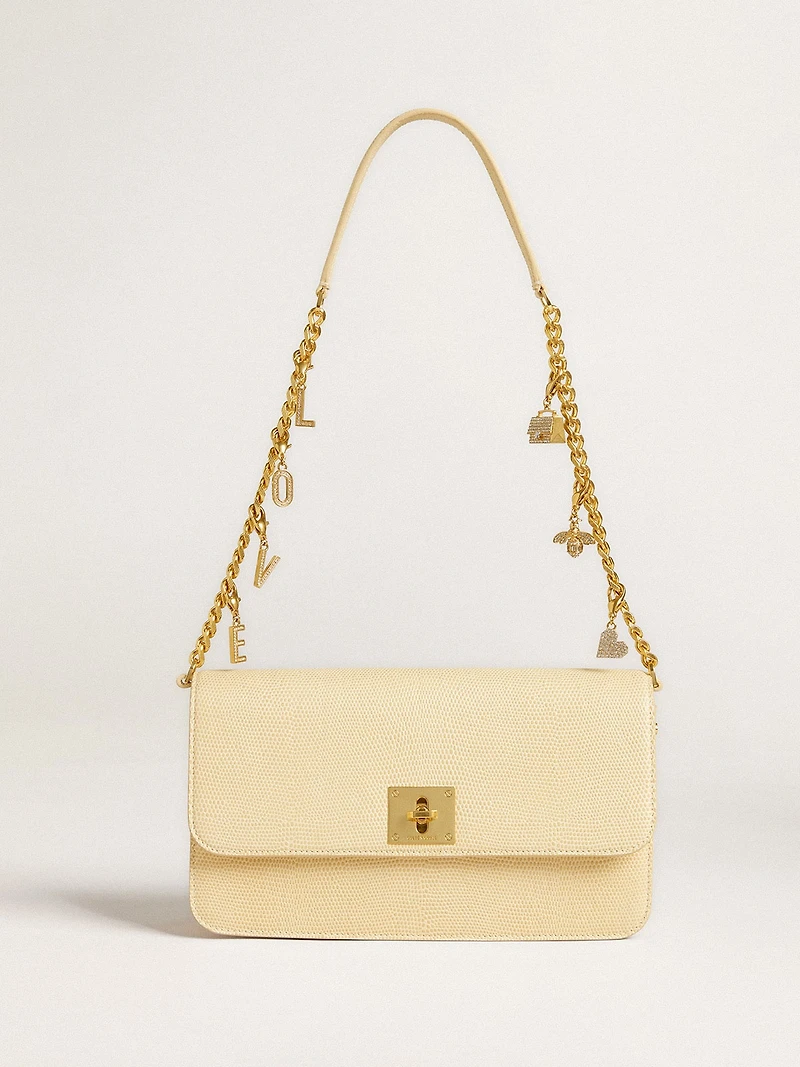 Letter V charm in gold-colored brass with crystals