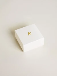 Lock-shaped charm in gold-colored brass with crystals