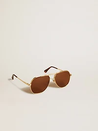 Aviator style sunglasses with gold frame and brown lenses