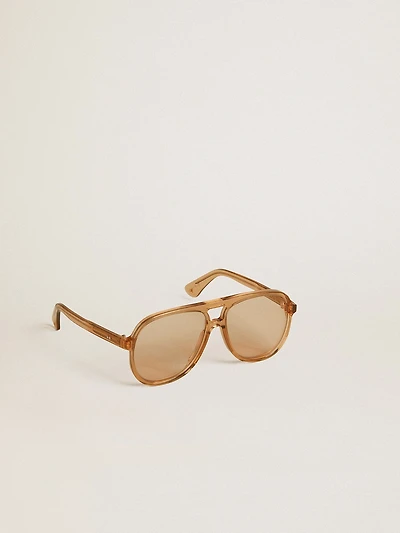 Aviator style sunglasses with honey-colored frame and lenses