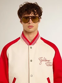 Aviator style sunglasses with tortoiseshell frame and green lenses