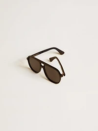 Aviator style sunglasses with black frame and lenses