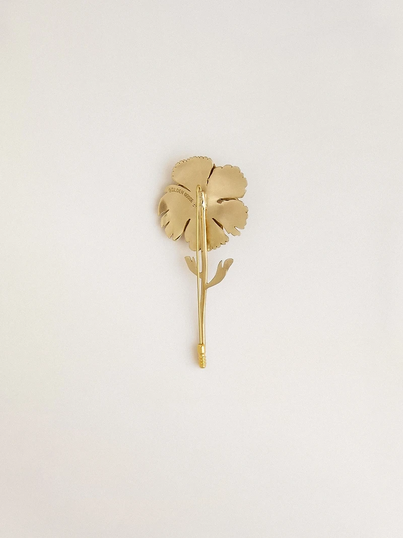 Gold pin with floral design