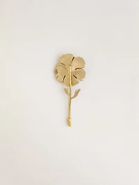 Gold pin with floral design