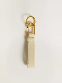 Worn white keyring