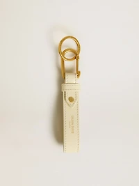 Worn white keyring