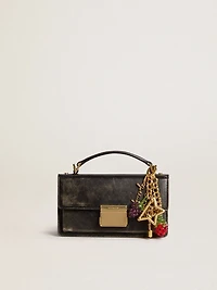 Gold-colored brass charm with Golden Goose signature