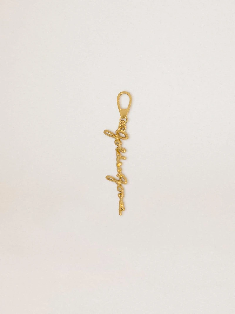 Gold-colored brass charm with Golden Goose signature