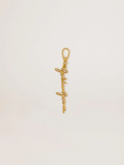 Gold-colored brass charm with Golden Goose signature