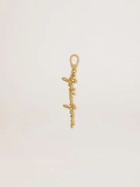 Gold-colored brass charm with Golden Goose signature