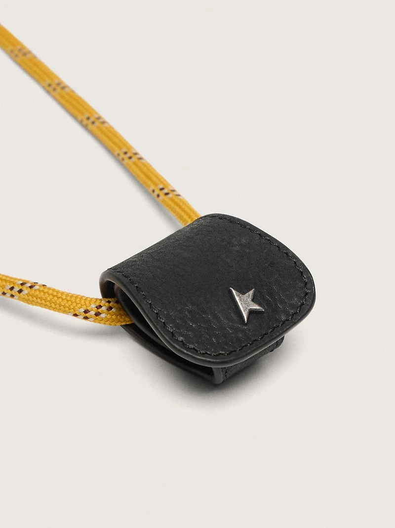 Glasses case with mustard-colored hiking lace and black leather clip