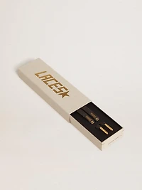 Dark gray lurex laces with contrasting gold logo