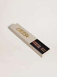 Salmon pink Lurex laces with contrasting black logo