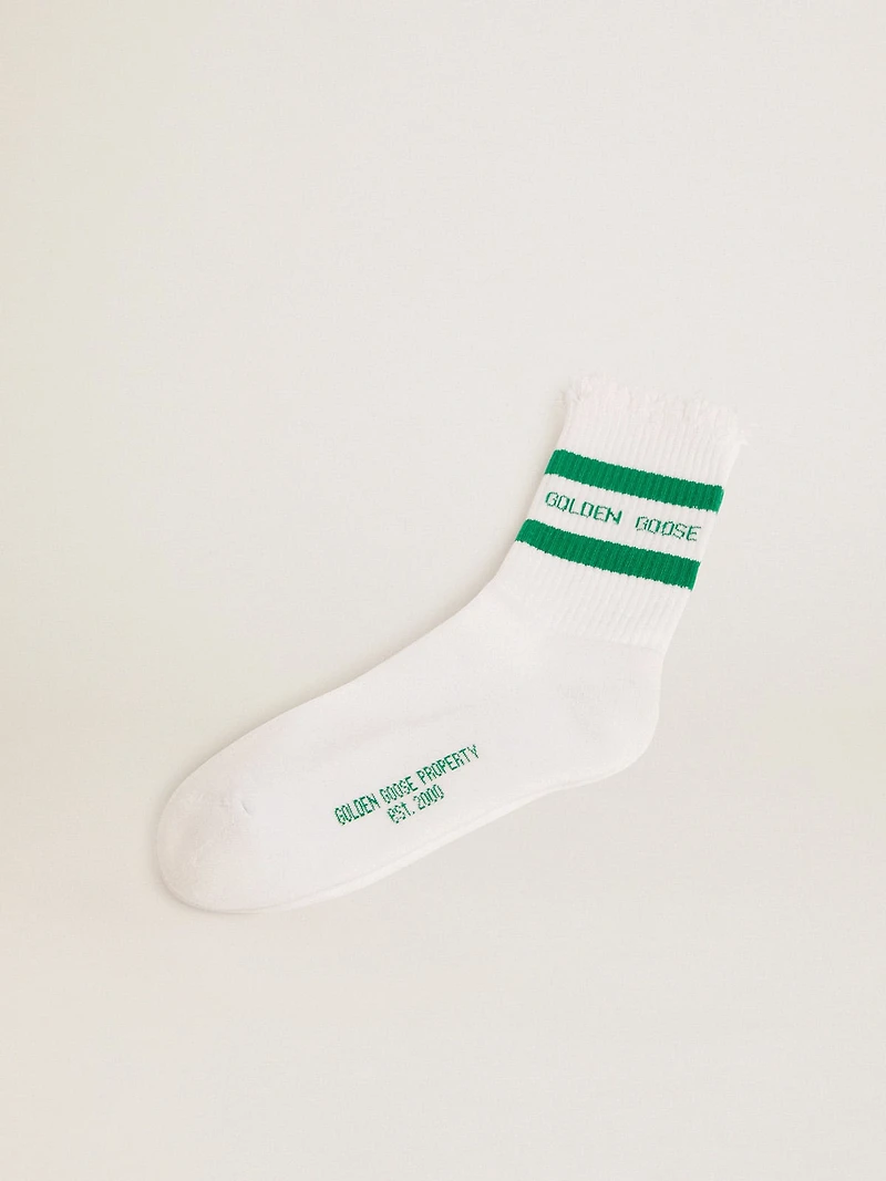 Cotton socks with distressed finishes, green stripes and logo