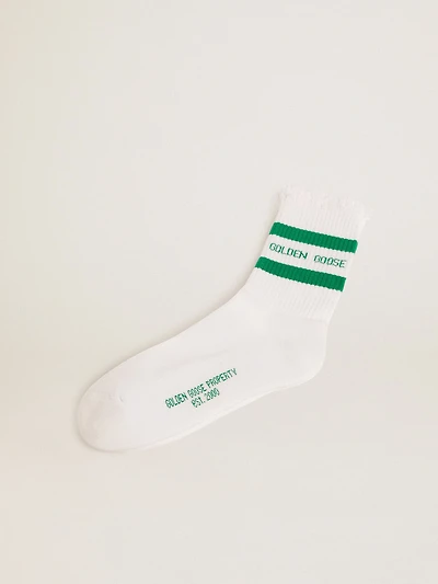 Cotton socks with distressed finishes, green stripes and logo