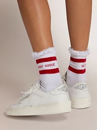 White socks with distressed details and red stripes