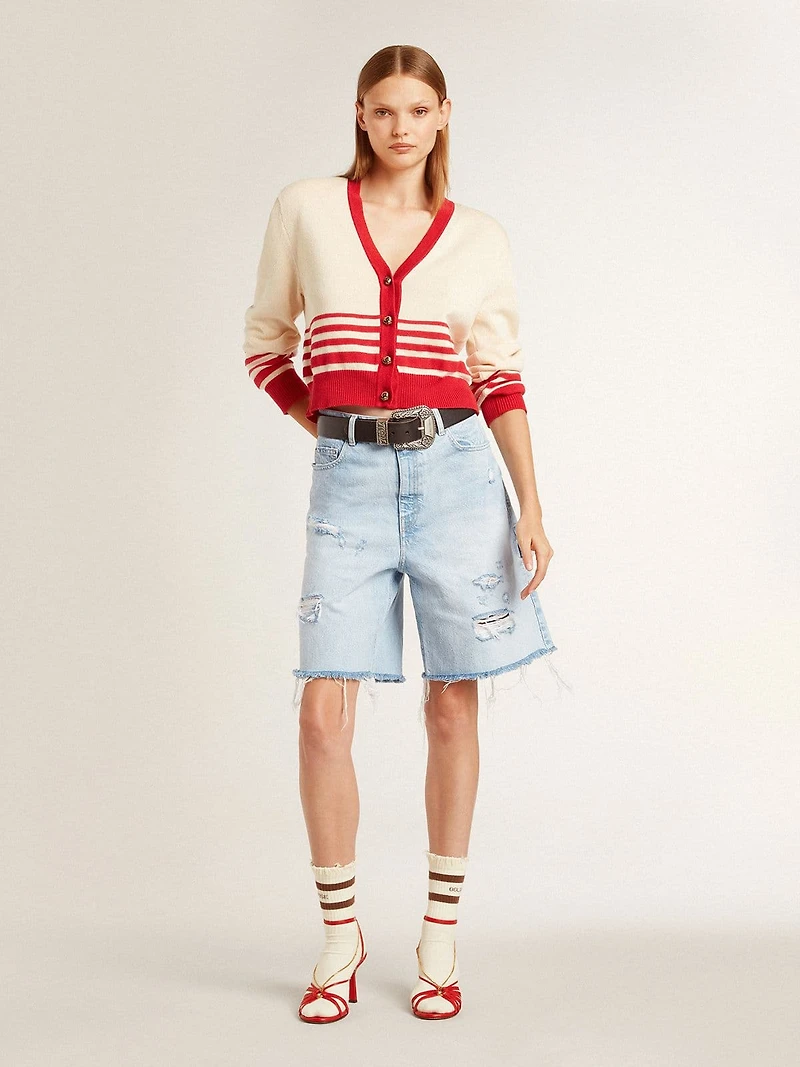 Worn-white socks with distressed details and brown stripes