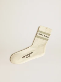 White socks with distressed details and gray stripes