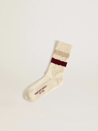 Worn-white socks with distressed details and beige burgundy stripes
