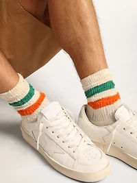 Distressed-finish white socks with green and orange stripes