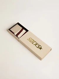 Brown socks with distressed details and worn-white stripes