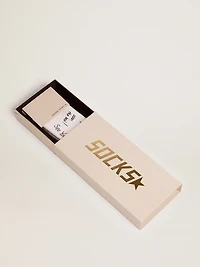 Optical white socks with black lettering