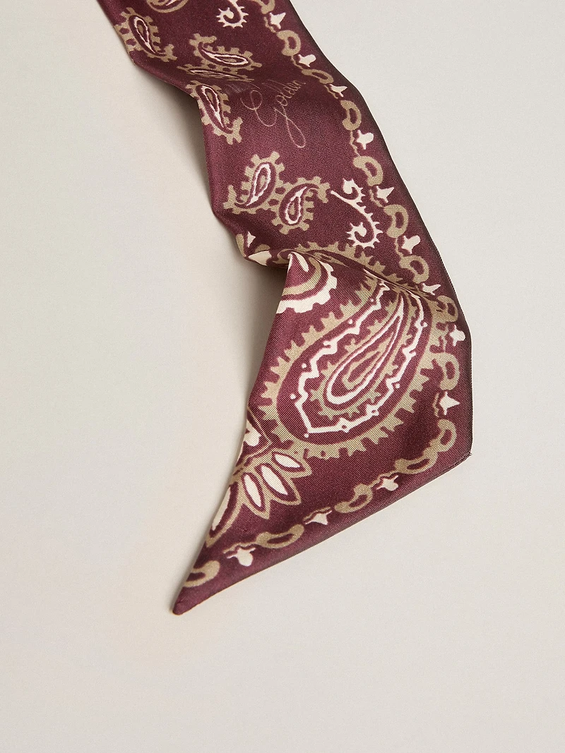 Ribbon in burgundy silk twill with paisley pattern