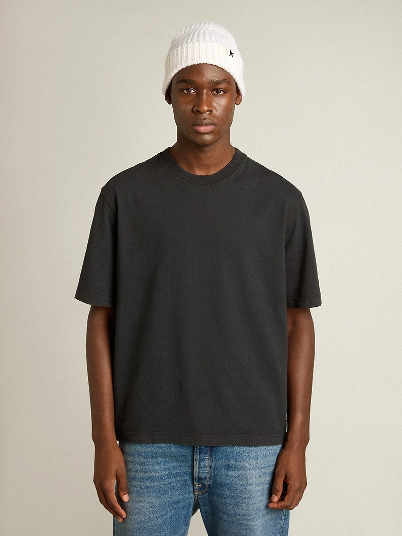 T-shirt washed black with reverse logo on the back
