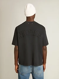 T-shirt washed black with reverse logo on the back